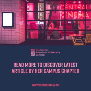 A neon-lit cinema lobby in pink and red tones with a person sitting at a table, promotion for Richmond American University in London.